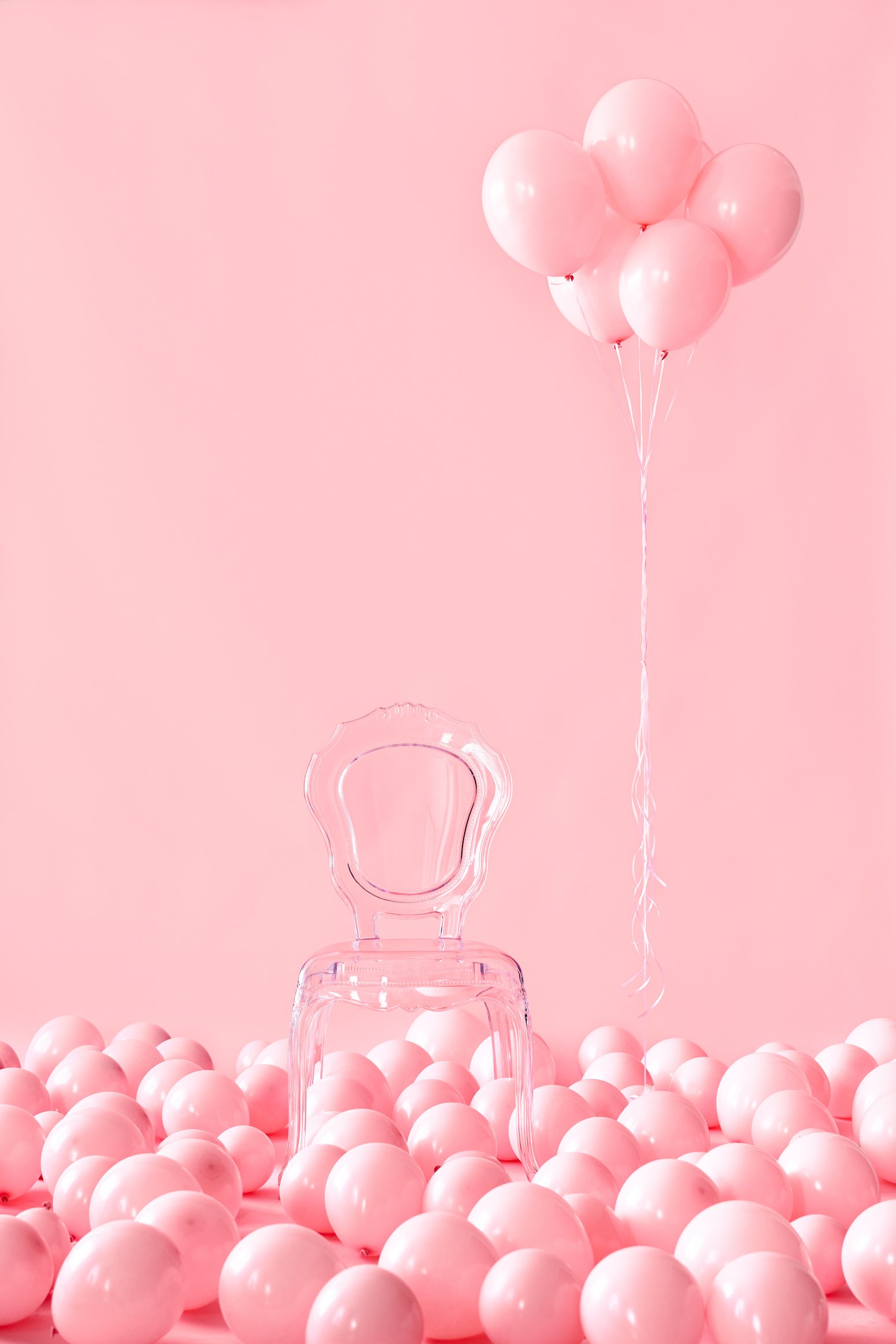 Empty Transparent Chair among Pink Air Balloon Background